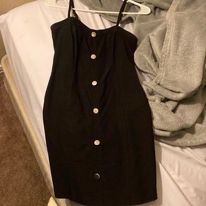 Tight black dress with buttons